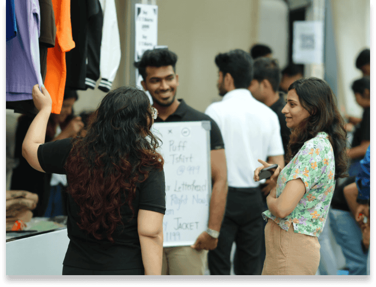 Interact with real customers while building a business